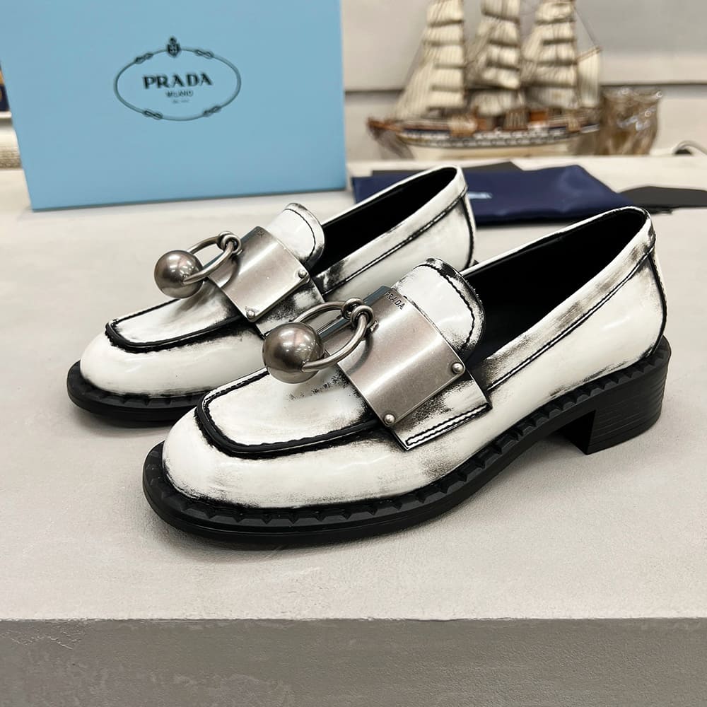 PRADA Brushed leather loafers with metal details