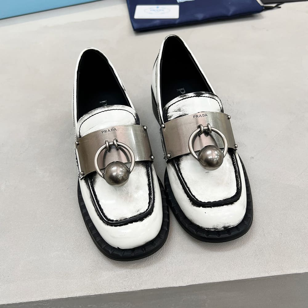 PRADA Brushed leather loafers with metal details