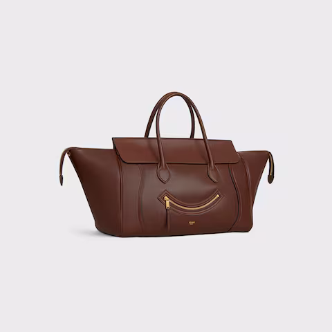 MEDIUM SMILING NEW LUGGAGE IN SUPPLE SHINY LAMBSKIN